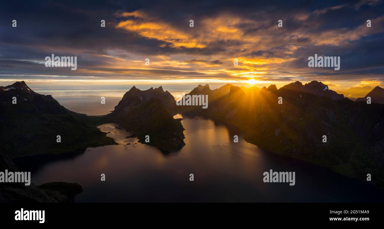 Landscape with mountains and fjord at sunset, Lofoten, Norway Stock Photo