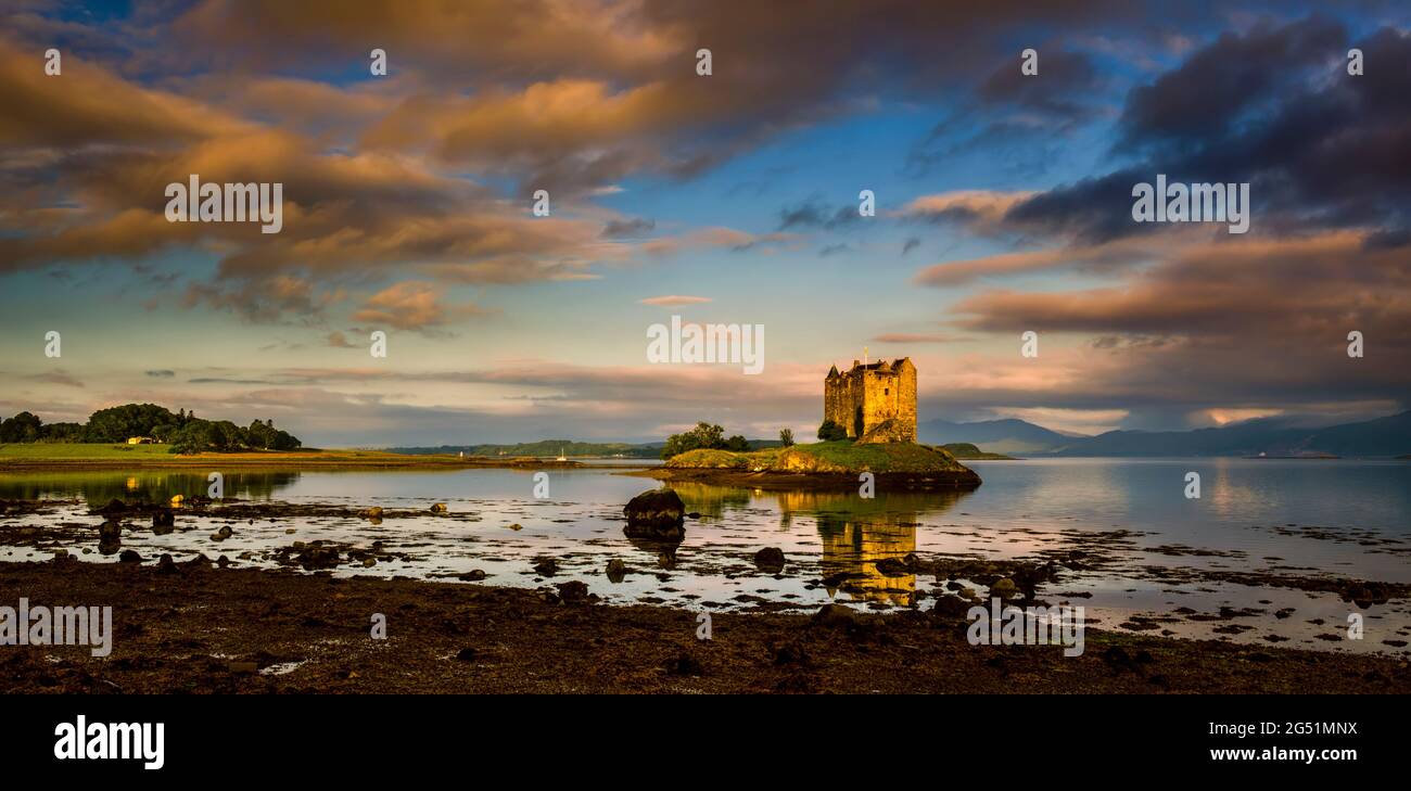 Castle Stalker on island at sunrise, Highlands, Scotland, UK Stock Photo