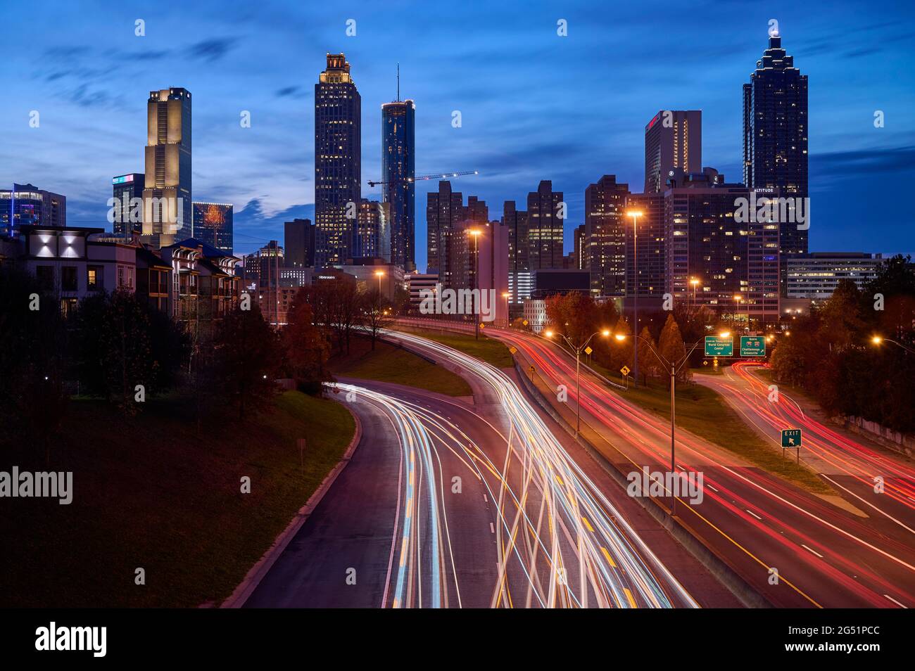 Light trails on road in city at night, Atlanta, Georgia, USA Stock Photo