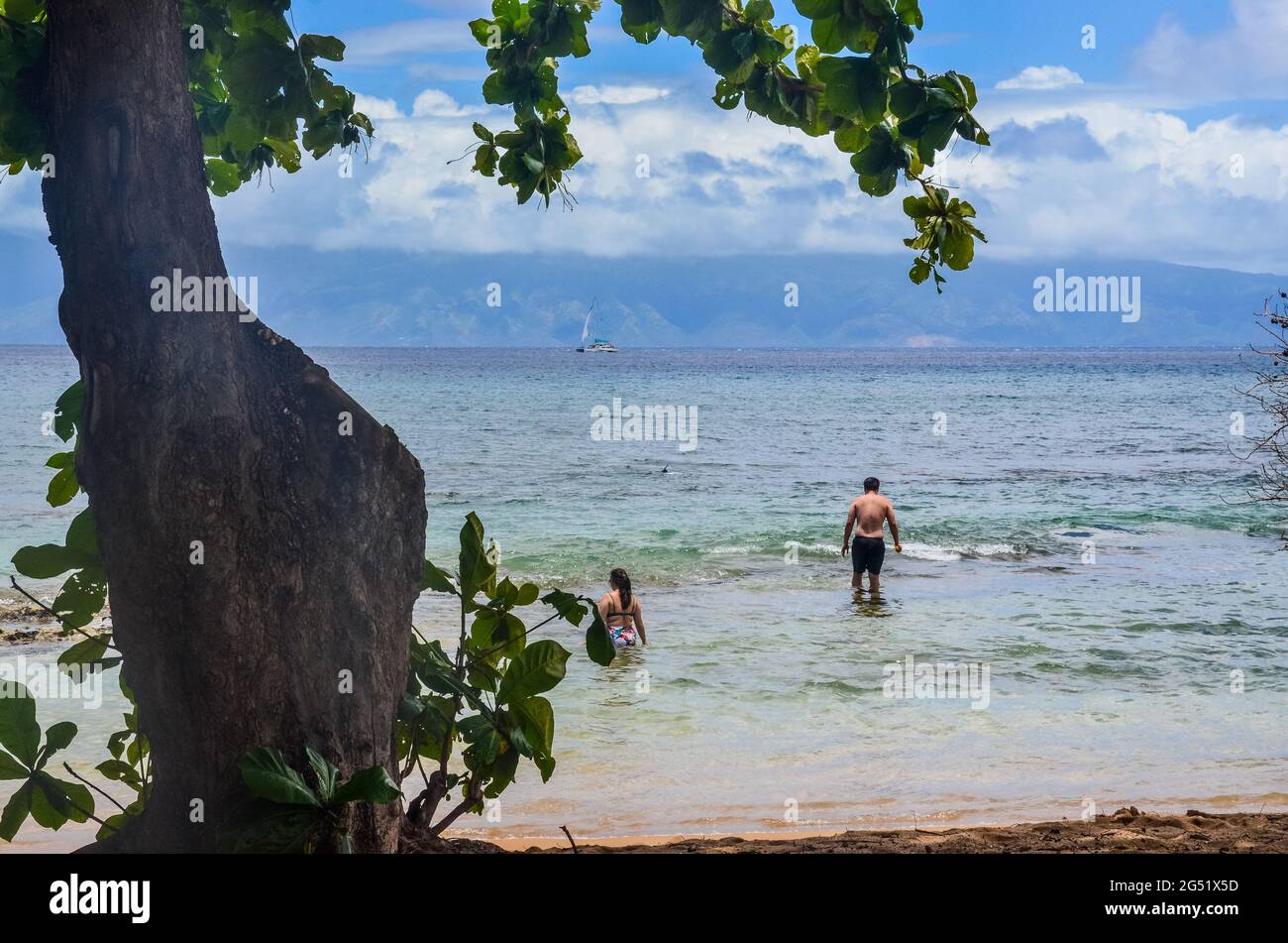 Honokowai Beach Park. Visitors swim and snorkel on public beach. Maui, Hawaii, USA. June 10, 2021. Stock Photo