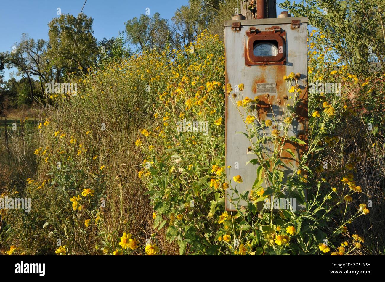 A rusting utility box is mounted on a pole at a commercial property in Warwick, Oklahoma. Stock Photo