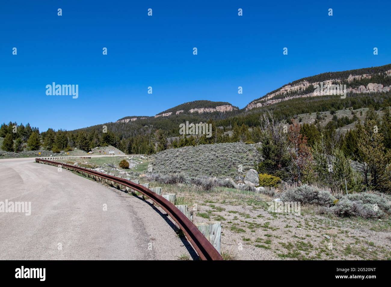 Highway 16 in the Bighorn National Forest, Wyoming in late May, horizontal Stock Photo