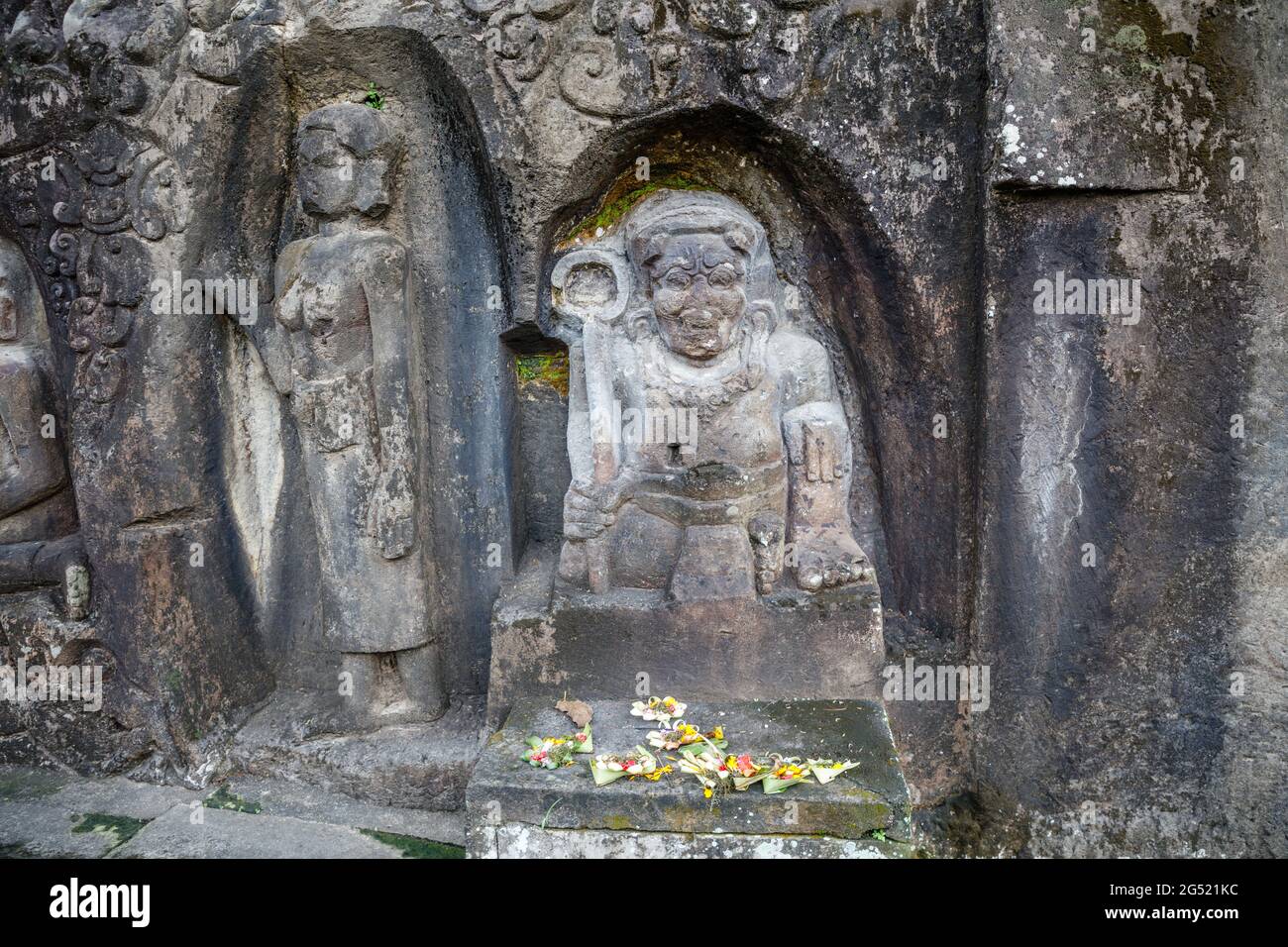 Yeh Pulu - Ancient relief in Desa Bedulu, Kabupaten Gianyar, Bali, Indonesia. Carving in the rock wall. Stock Photo