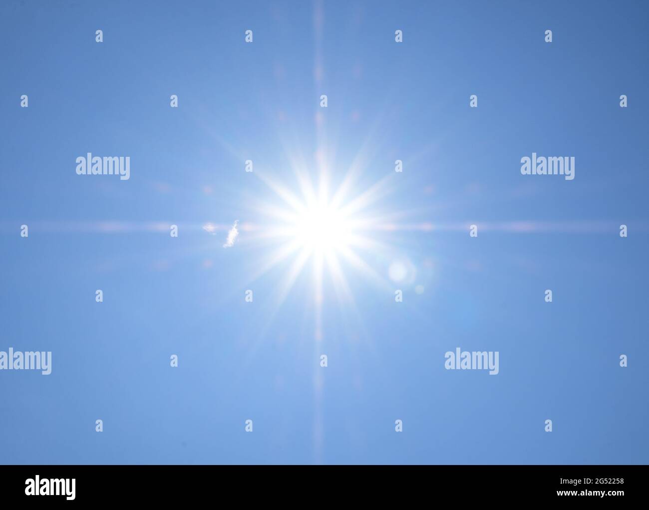 Sun and blue sky background Stock Photo