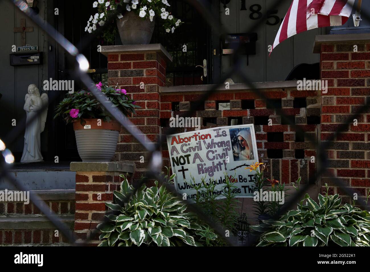 An anti-abortion sign is seen on outside a home on the West Side of Cleveland, Ohio, U.S., June 24, 2021. REUTERS/Shannon Stapleton Stock Photo