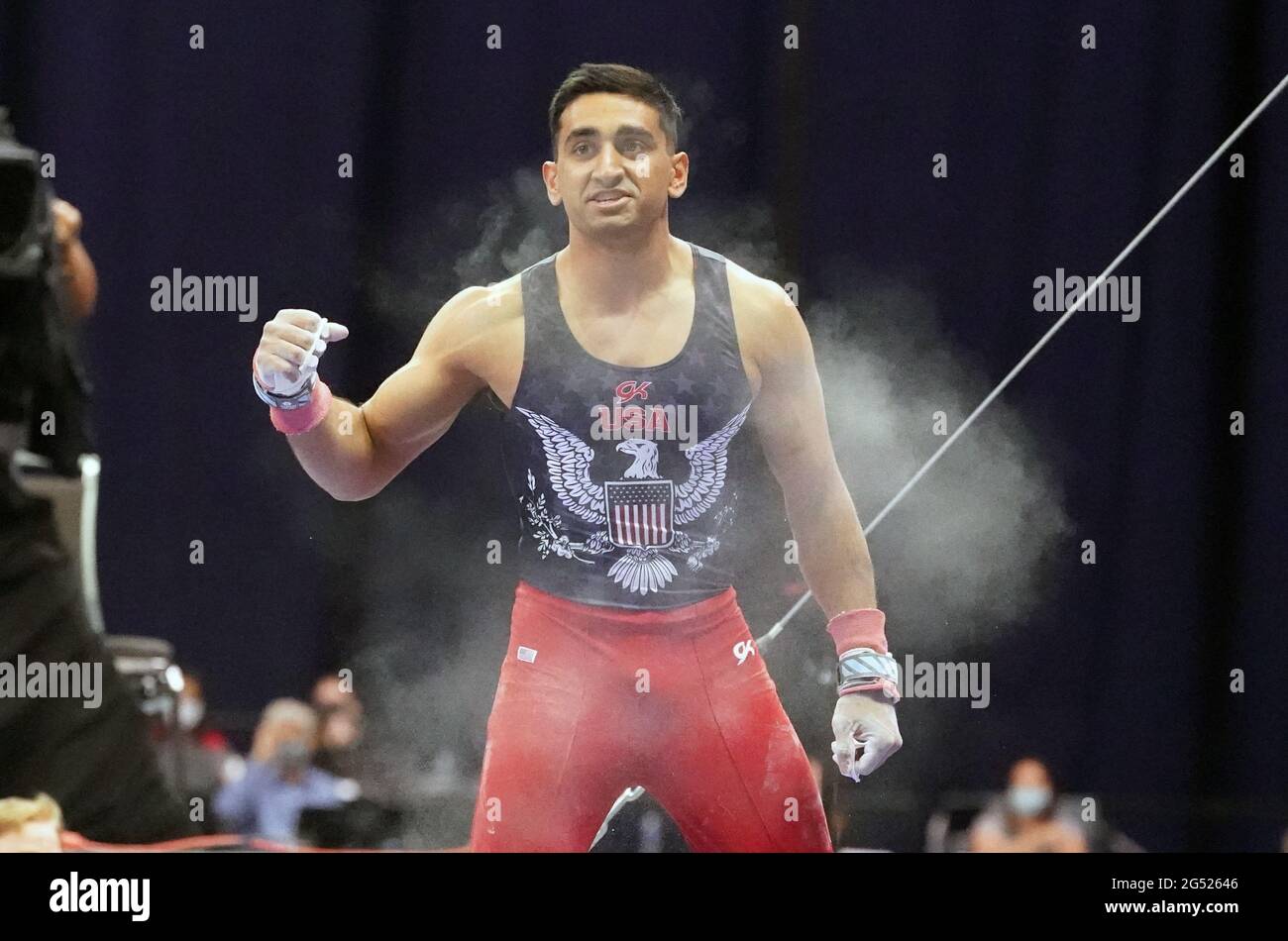 Akash Modi of Stanford University pumps his fist as he dismounts the
