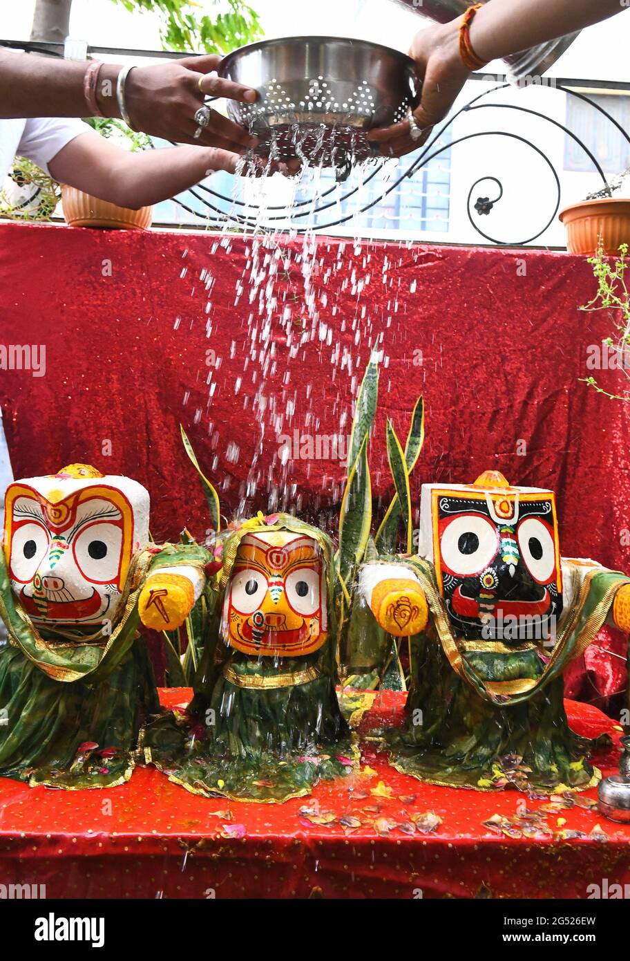 Beawar Rajasthan India June 24 21 Hindu Devotees Pour Water On Idols Of Lord Jagannath Balbhadra And Subhadra During Holy Festival Snan Yatra Or A Bathing Ceremony On Jyeshtha Purnima Full Moon
