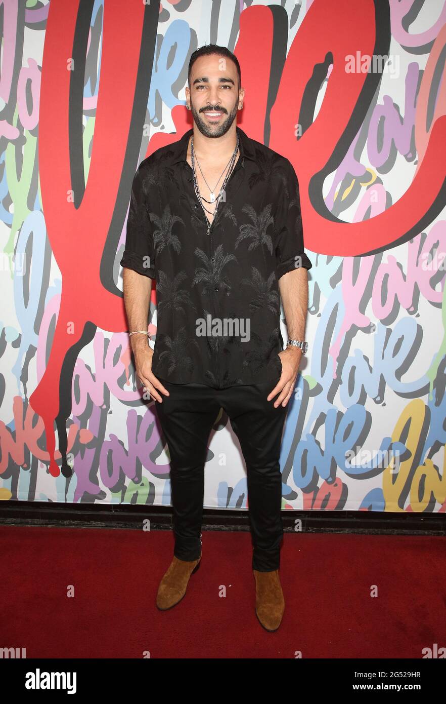 Beverly Hills, CA -June 24 - Adil Rami, at 2021 The Cool HeART Gallery opening featuring Artist Richard Hutchins at The Sofitel Los Angeles at Beverly Hills California on June 24, 2021. Credit: Faye Sadou/MediaPunch Credit: MediaPunch Inc/Alamy Live News Stock Photo