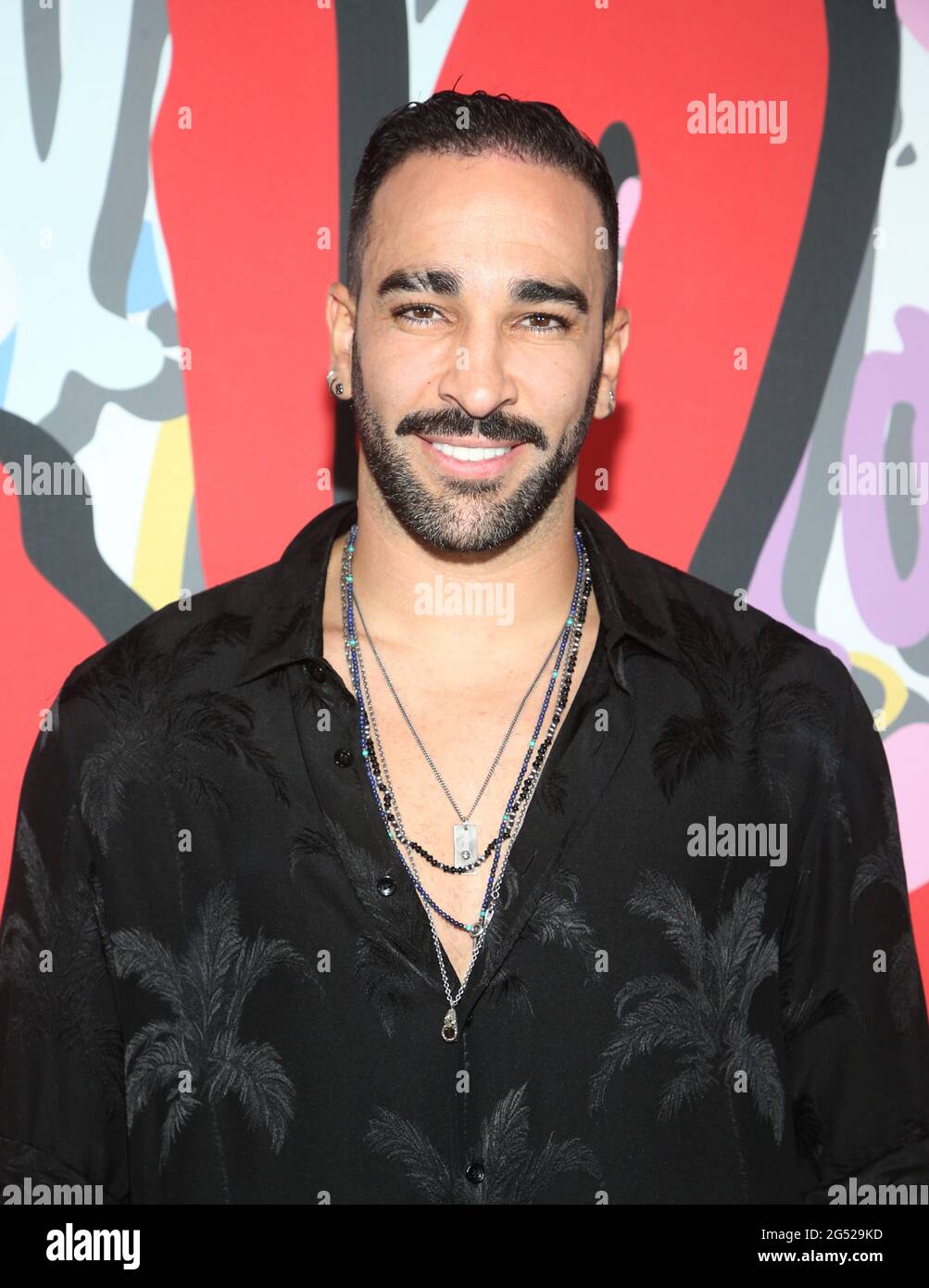 Beverly Hills, CA -June 24 - Adil Rami, at 2021 The Cool HeART Gallery opening featuring Artist Richard Hutchins at The Sofitel Los Angeles at Beverly Hills California on June 24, 2021. Credit: Faye Sadou/MediaPunch Credit: MediaPunch Inc/Alamy Live News Stock Photo