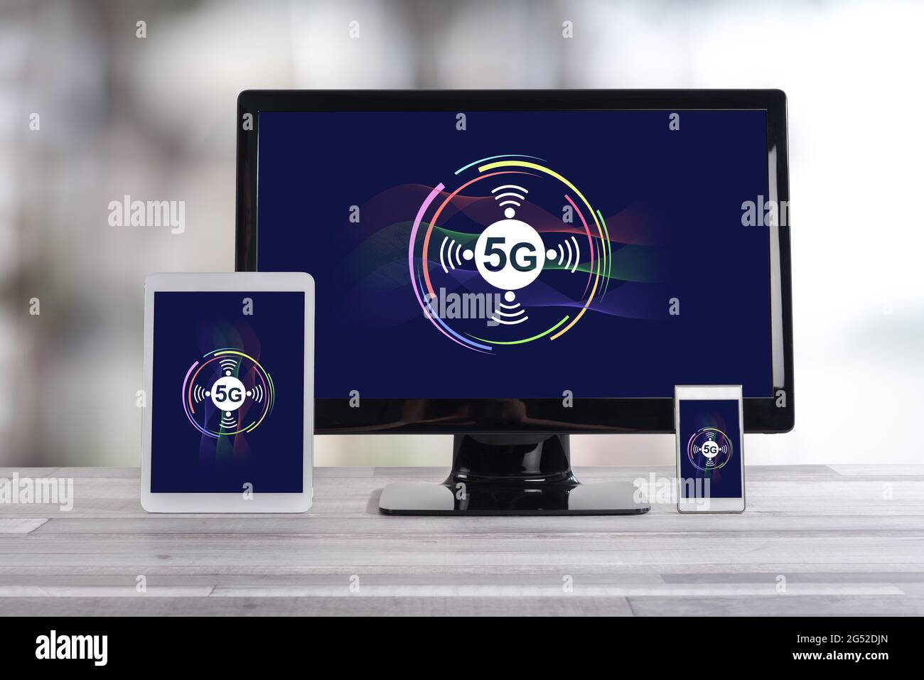 5g concept shown on different information technology devices Stock Photo
