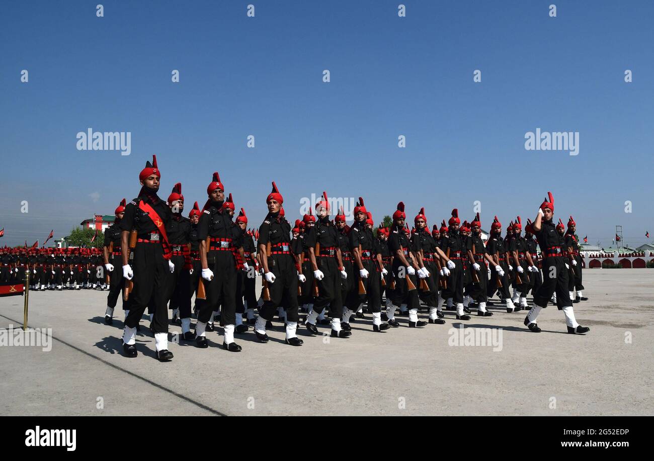 Srinagar. 25th June 2021. The Jammu and Kashmir Light Infantry Regimental Centre, showcased its latest batch of passing out young soldiers from the UT of J&K. A total of 514 young soldiers were attested today after completing one year of strenuous training, at a glittering parade at the Bana Singh Parade Ground of JAK LI Regimental centre. Credit: Majority World CIC/Alamy Live News Stock Photo