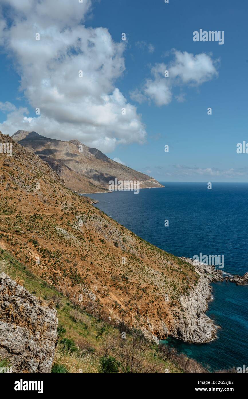 Beach vacation in Italy, Sicily, turquoise water,sandy beaches,hiking trails.Holiday paradise travel scenery.Scenic coastline of Zingaro Nature Stock Photo