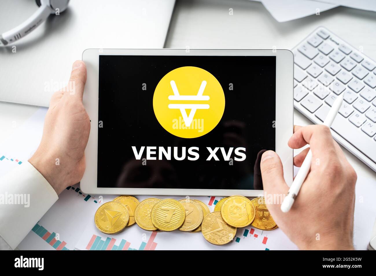 Russia Moscow 06.05.2021 Logo of cryptocurrency DEX decentralized money market, stablecoin protocol Venus XVS in tablet.Trading blockchain platform to Stock Photo