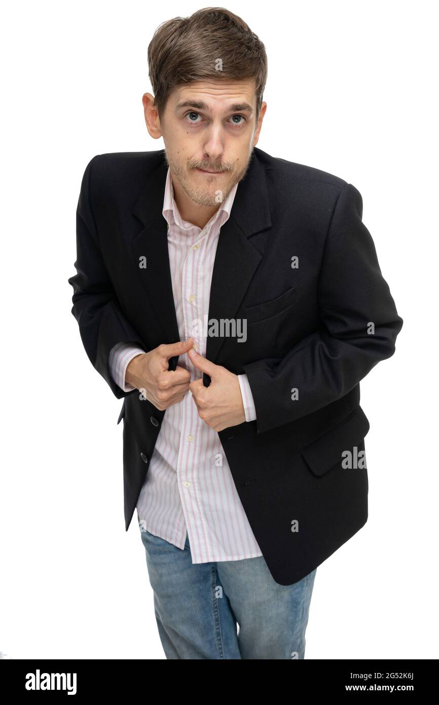 Young handsome tall slim white man with brown hair in black blazer isolated on white background Stock Photo