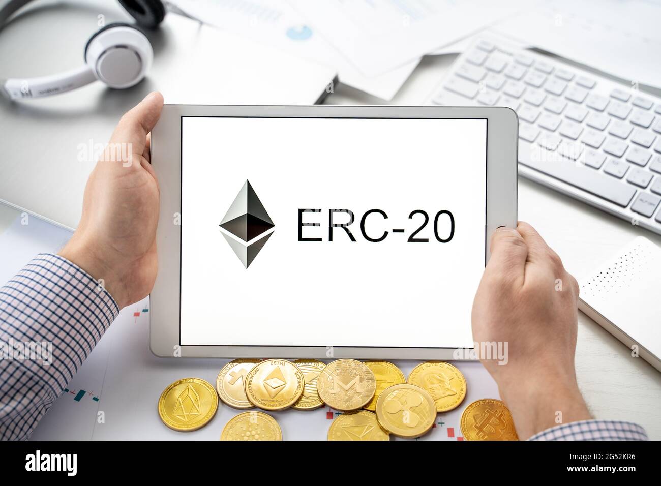 Russia Moscow 06.05.2021.Businessman holding tablet with logo of ERC-20  official protocol of Ethereum ETH network. Standard for creating tokens on  Eth Stock Photo - Alamy