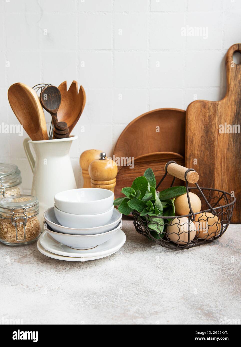 https://c8.alamy.com/comp/2G52KYN/kitchen-utensils-tools-and-dishware-on-on-the-background-white-tile-wall-interior-modern-kitchen-space-in-bright-colors-blank-space-for-a-text-fr-2G52KYN.jpg