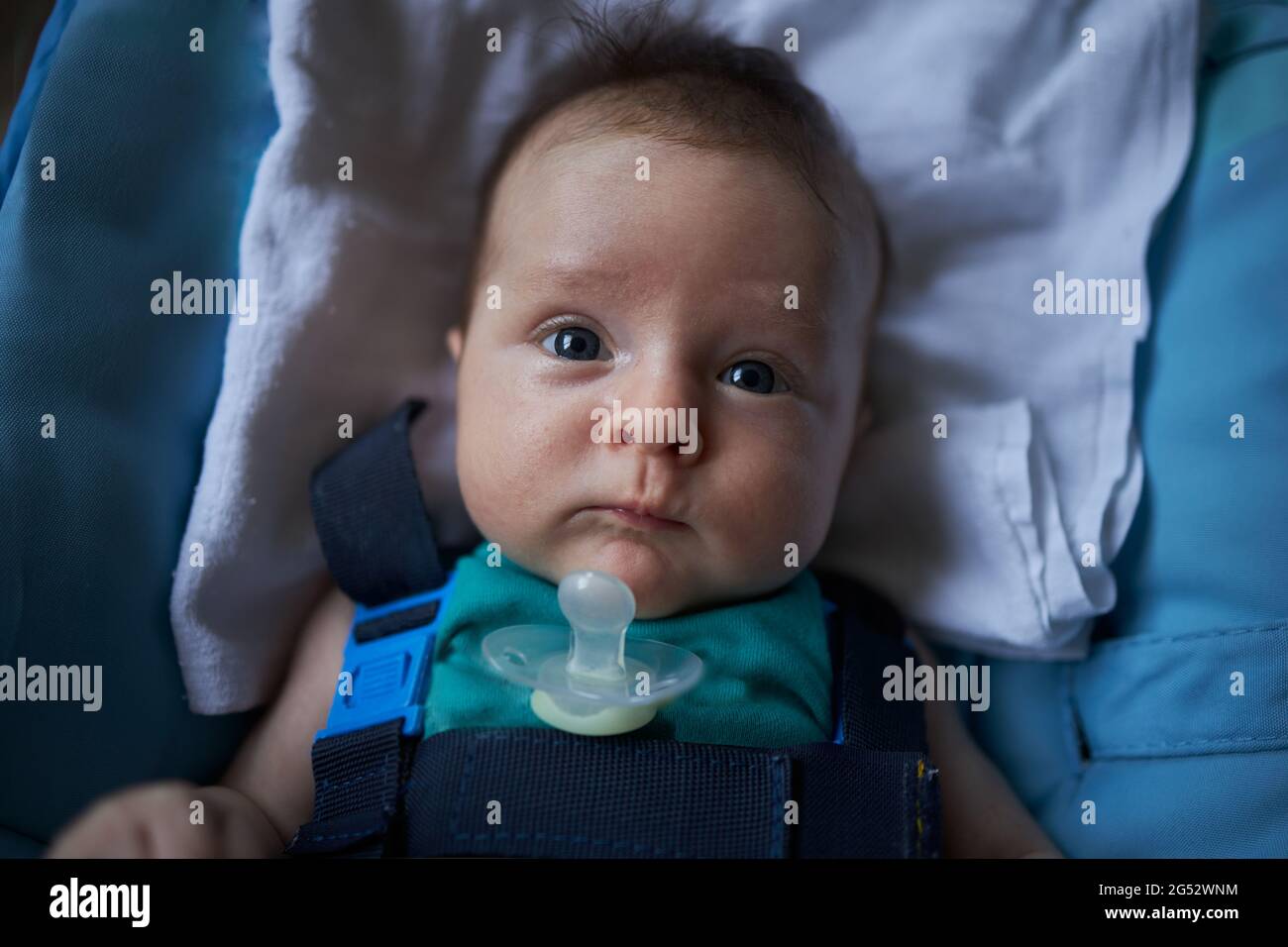 Small baby laying and wondering Stock Photo