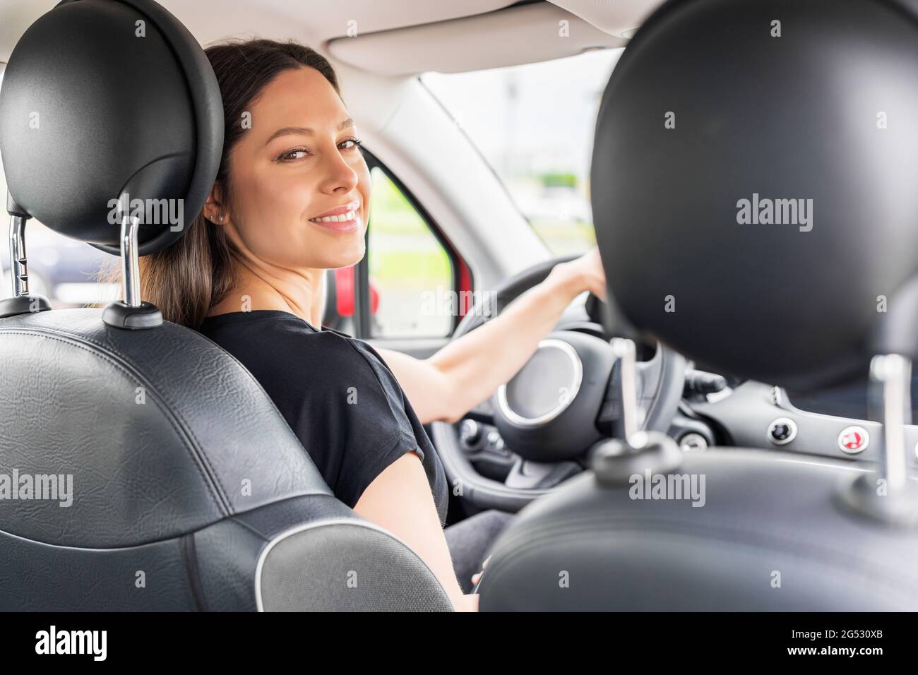 A Girl Is Driving Her Car Wearing Flip Flops. Stock Photo, Picture and  Royalty Free Image. Image 106051171.