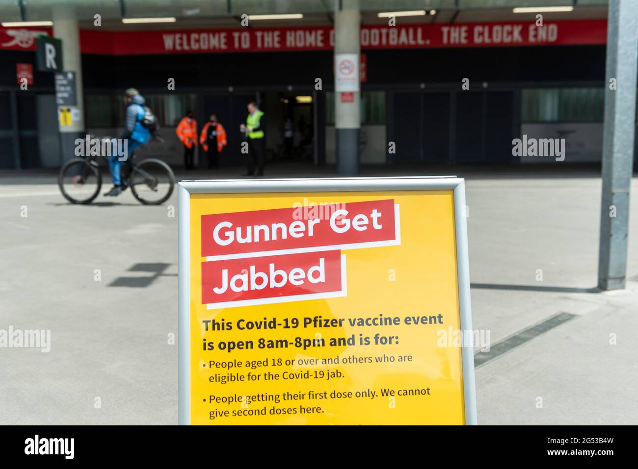 London, UK. 25th June, 2021. Sign outside the stadium. People queue up to receive a first dose of the Pfizer vaccine at a pop-up mass vaccination clinic Arsenal's Emirates Stadium as part of a “Gunner Get Jabbed” event organised by Islington Council, the local GP federation and the football club. The NHS is also promoting a number of walk-in clinics this weekend across the capital to try to increase the number of over 18s receiving a jab as cases of the Delta variant are reported to be on the rise. Credit: Stephen Chung/Alamy Live News Stock Photo