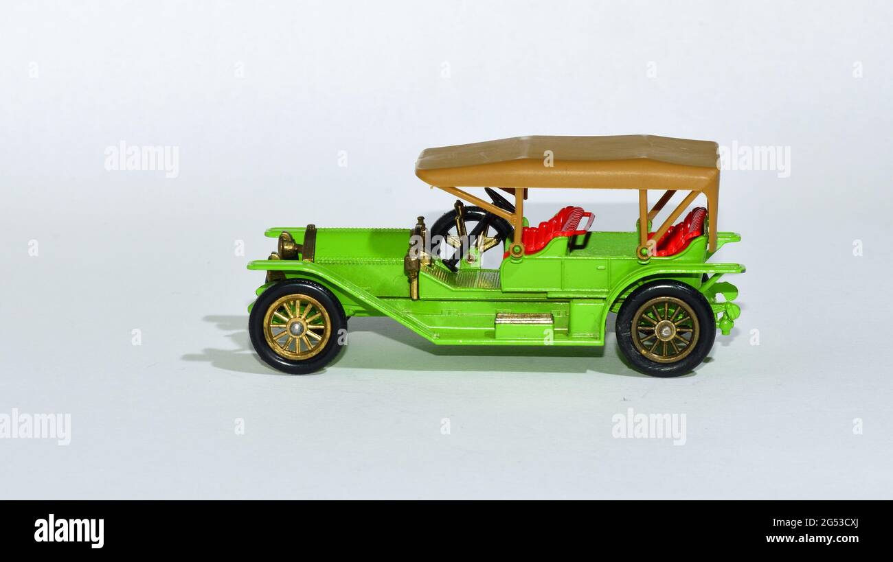 Toy diecast model of a Green 1912 Simplex motor car Y8 a Matchbox yesteryear product by Lesney with white   background Stock Photo