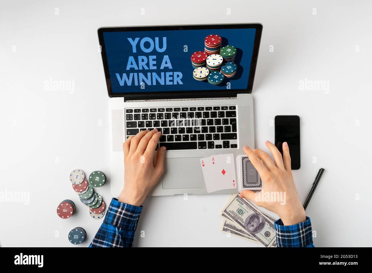 overhead person playing the gamble games online at home and win the ...