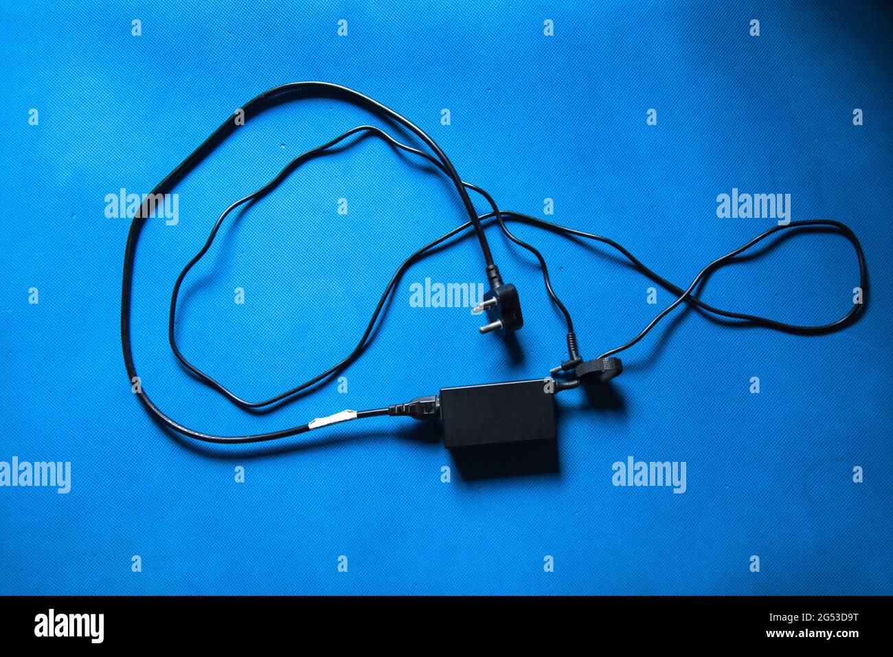 Laptop charging device on a background with use of selective focus Stock Photo