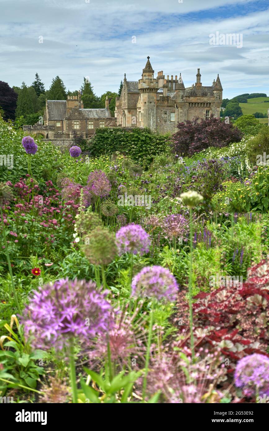 Beautiful flower beds in the walled garden of Abbotsford House in the Scottish Borders on a sunny summers day. Stock Photo