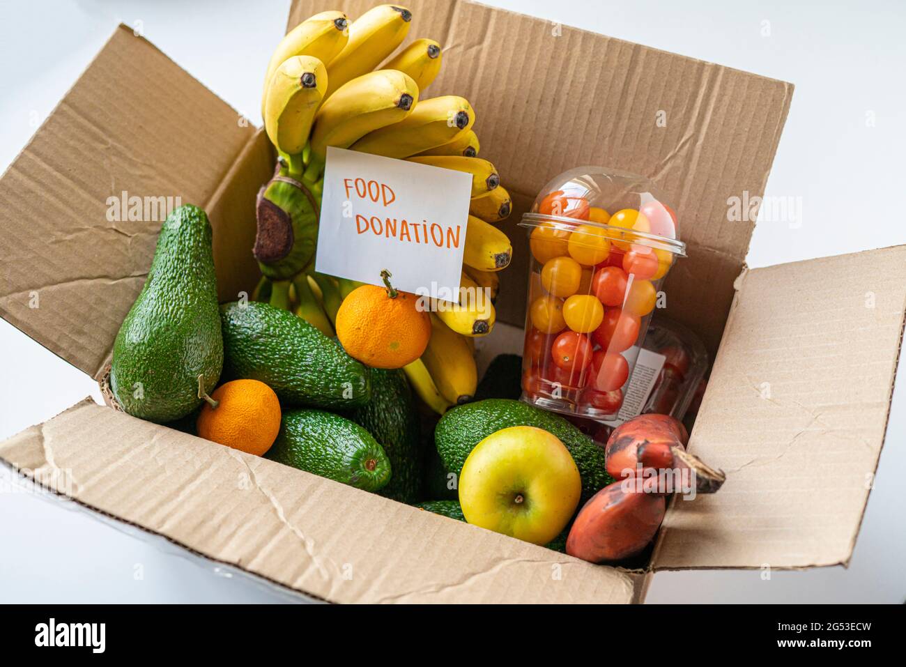 Food donation box children hi-res stock photography and images - Alamy