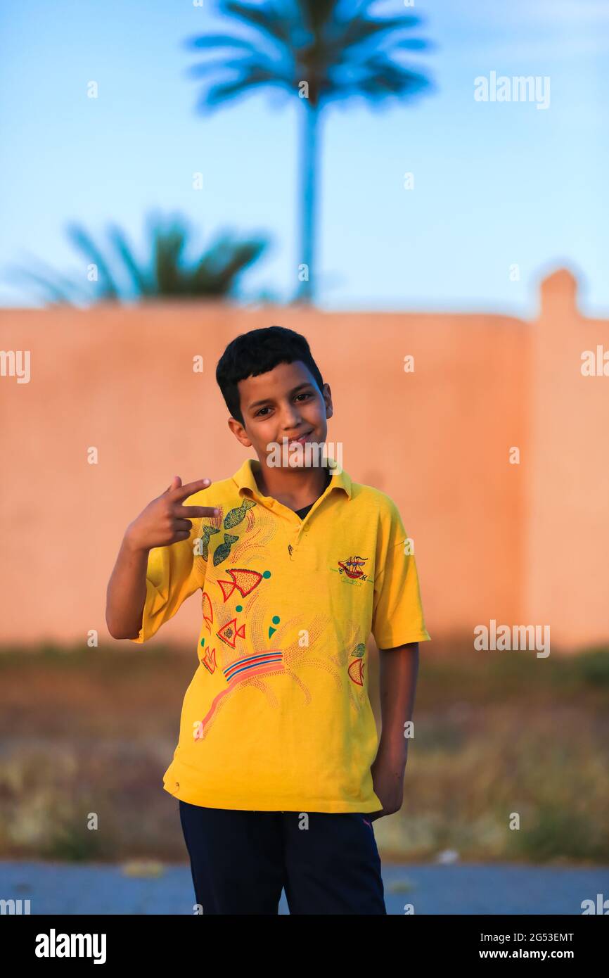 Marrakech, Morocco - 03 MAY 2021 : Moroccan young boy posing  in Marrakech city Stock Photo