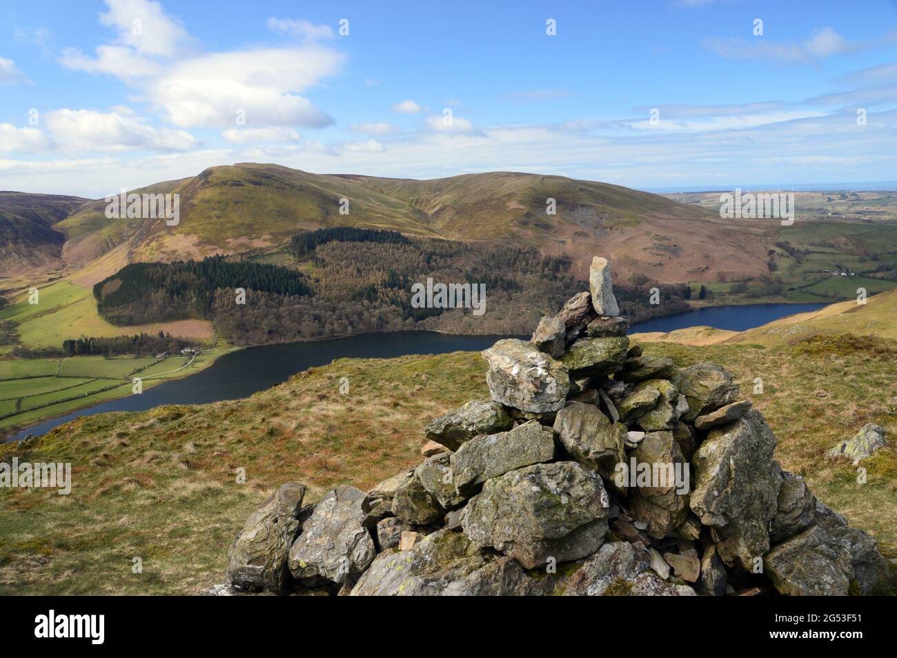 Carling Knott and the Wainwright Burnbank Fell above Loweswater Lake from the Pile of Stones (Cairn) on the Summit of Loweswater Fell, Cumbria, UK. Stock Photo