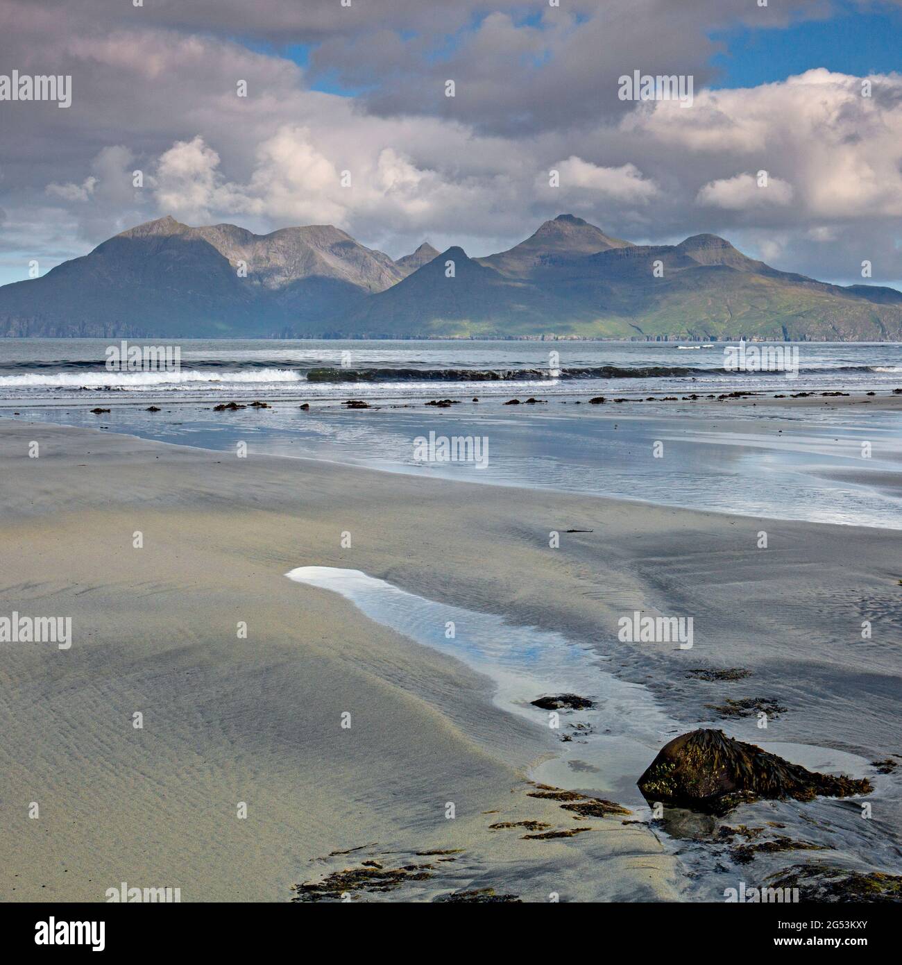 Isle of Rum from Laig bay, Eigg, Inner Hebrides, Scotland Stock Photo