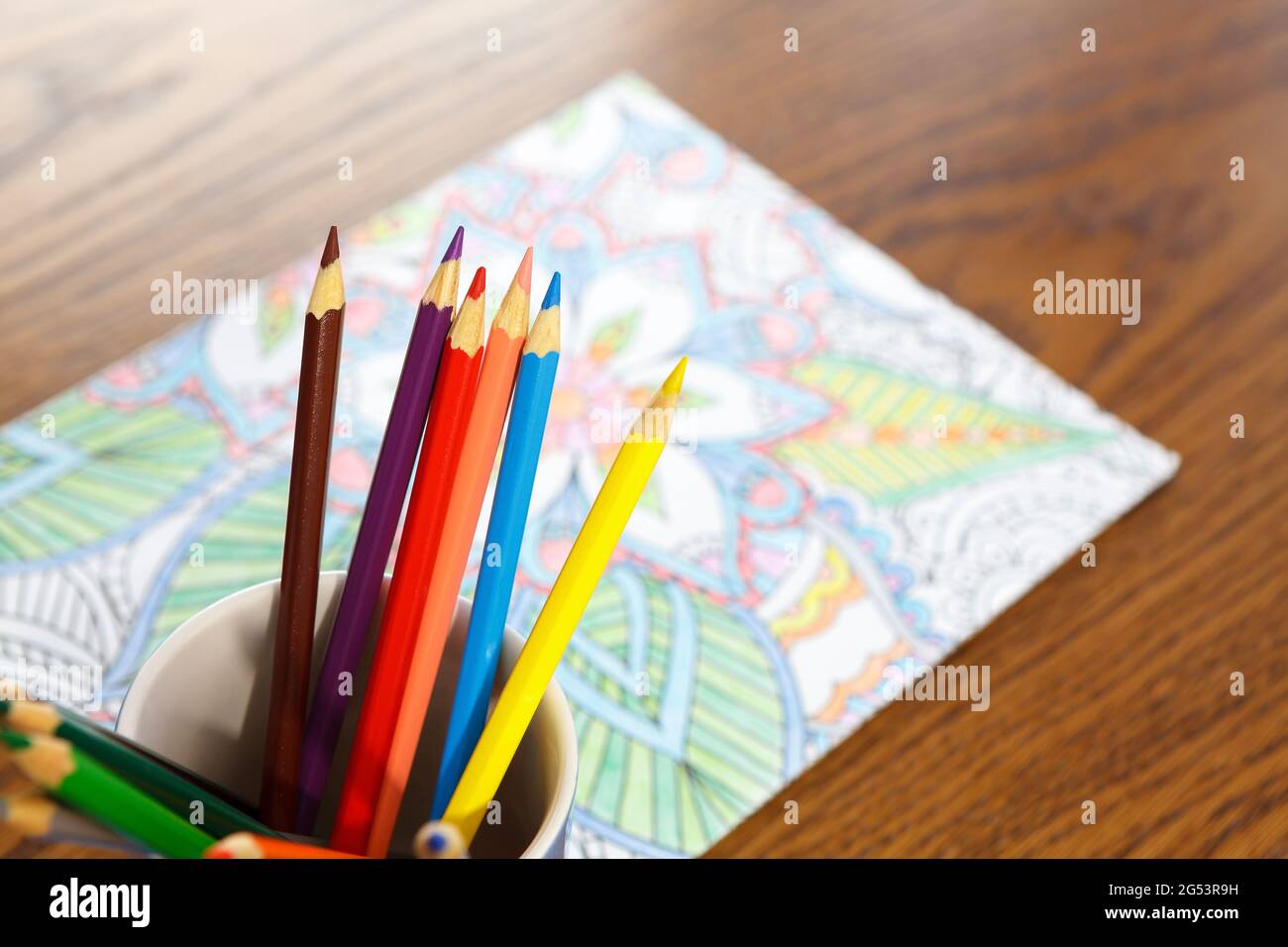 https://c8.alamy.com/comp/2G53R9H/adult-coloring-book-and-crayons-on-the-table-2G53R9H.jpg