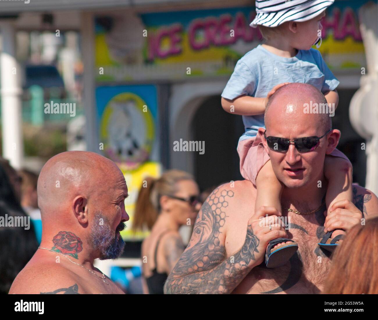 Tattooed fathers in Brighton Stock Photo