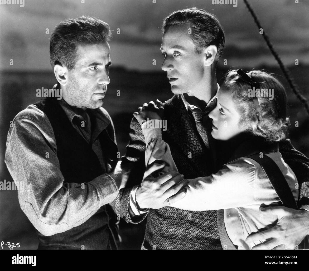 HUMPHREY BOGART LESLIE HOWARD and BETTE DAVIS in THE PETRIFIED FOREST 1936 director ARCHIE MAYO play Robert E. Sherwood screenplay Charles Kenyon and Delmer Daves Warner Bros. Stock Photo
