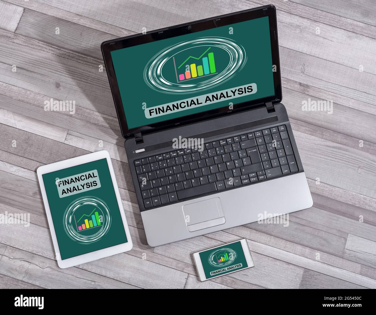 Financial analysis concept shown on different information technology ...