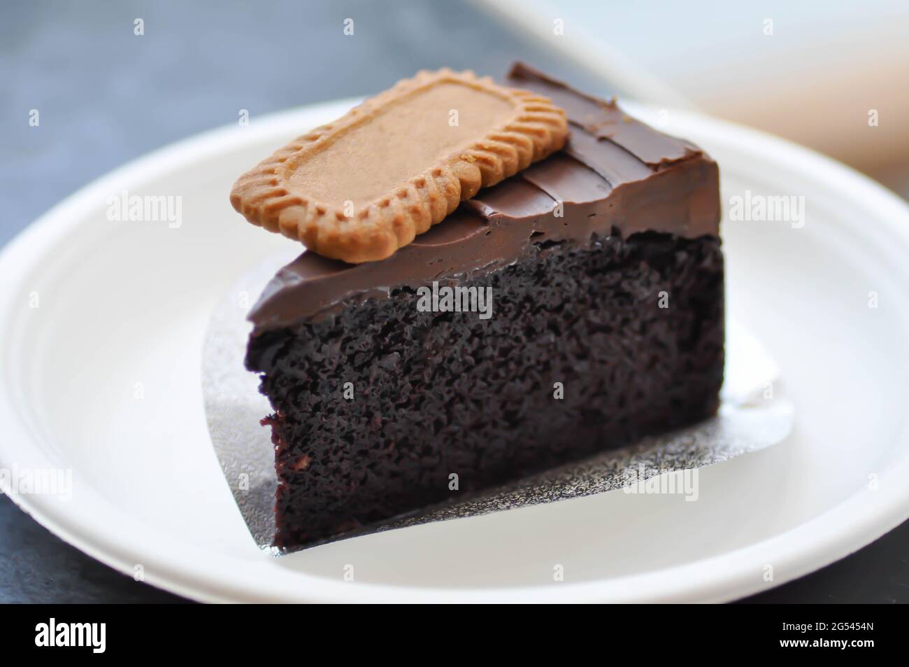 chocolate cake or dark chocolate cake with biscuit topping Stock Photo ...