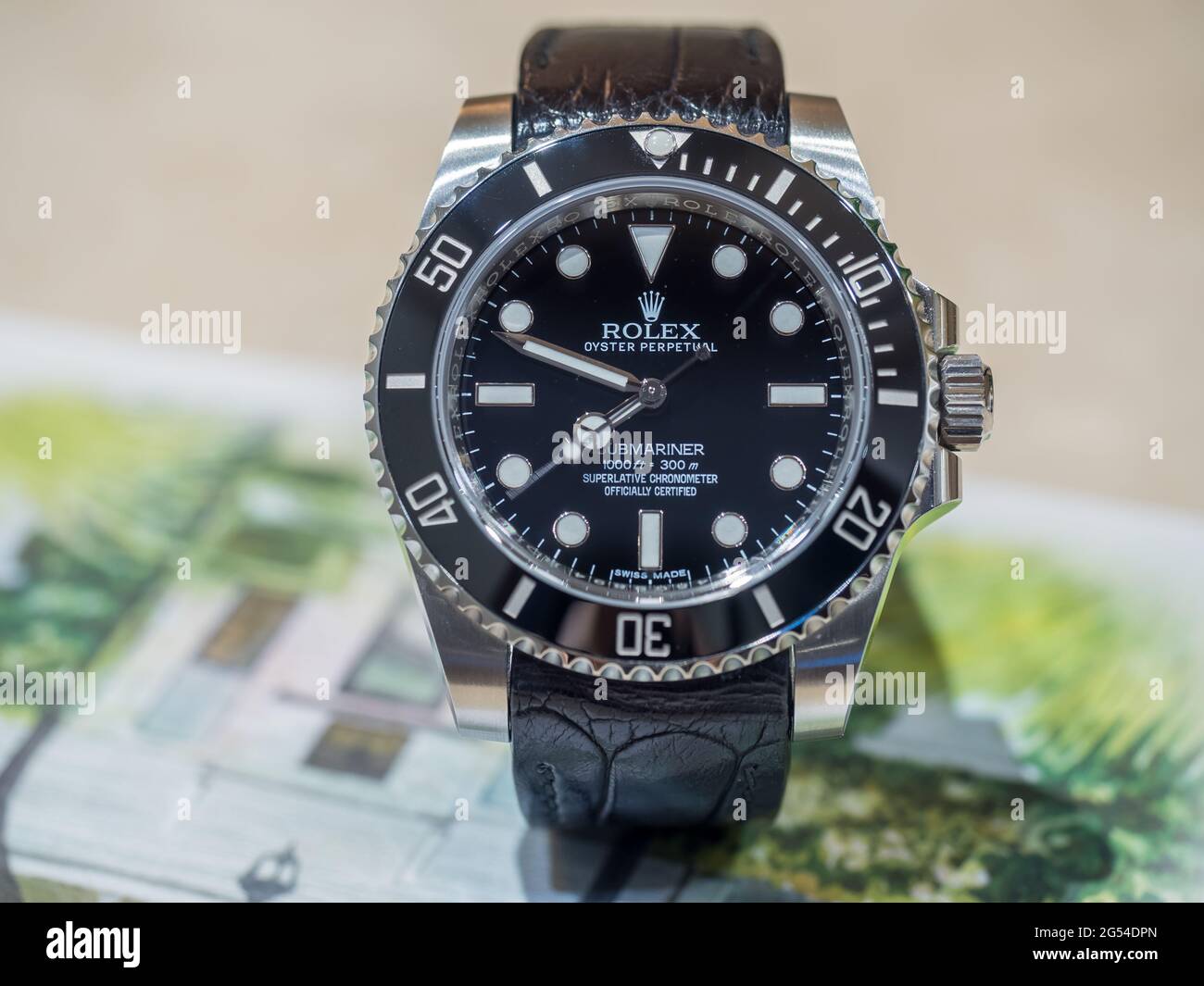 BANGKOK - SEPTEMBER 2 : Rolex submariner no date model with aligator  leather strap lay on colorful postcard was taken in Bangkok, Thailand, on  Septemb Stock Photo - Alamy