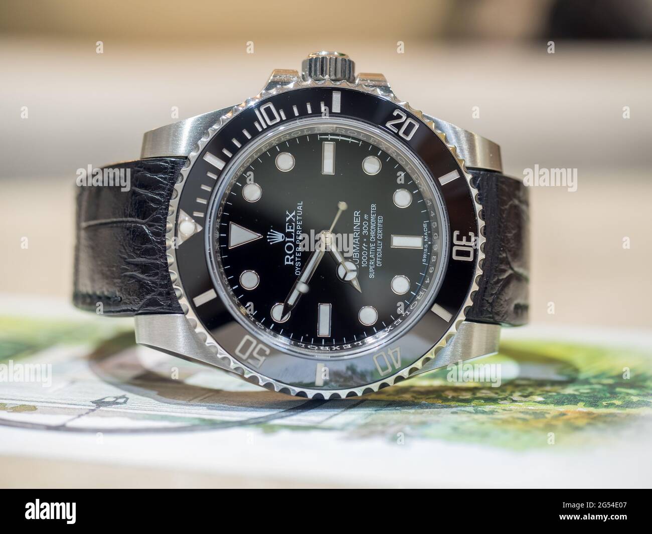 BANGKOK - SEPTEMBER 2 : Rolex submariner no date model with aligator  leather strap lay on colorful postcard was taken in Bangkok, Thailand, on  Septemb Stock Photo - Alamy