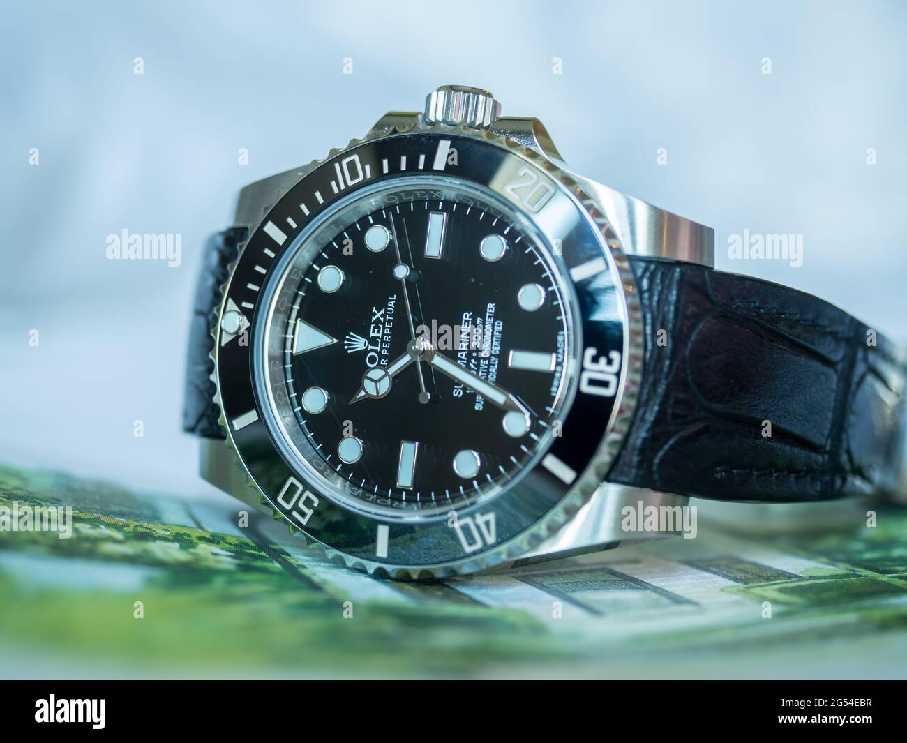 BANGKOK - SEPTEMBER 3 : Rolex submariner no date model with aligator  leather strap lay on colorful postcard was taken in Bangkok, Thailand, on  Septemb Stock Photo - Alamy