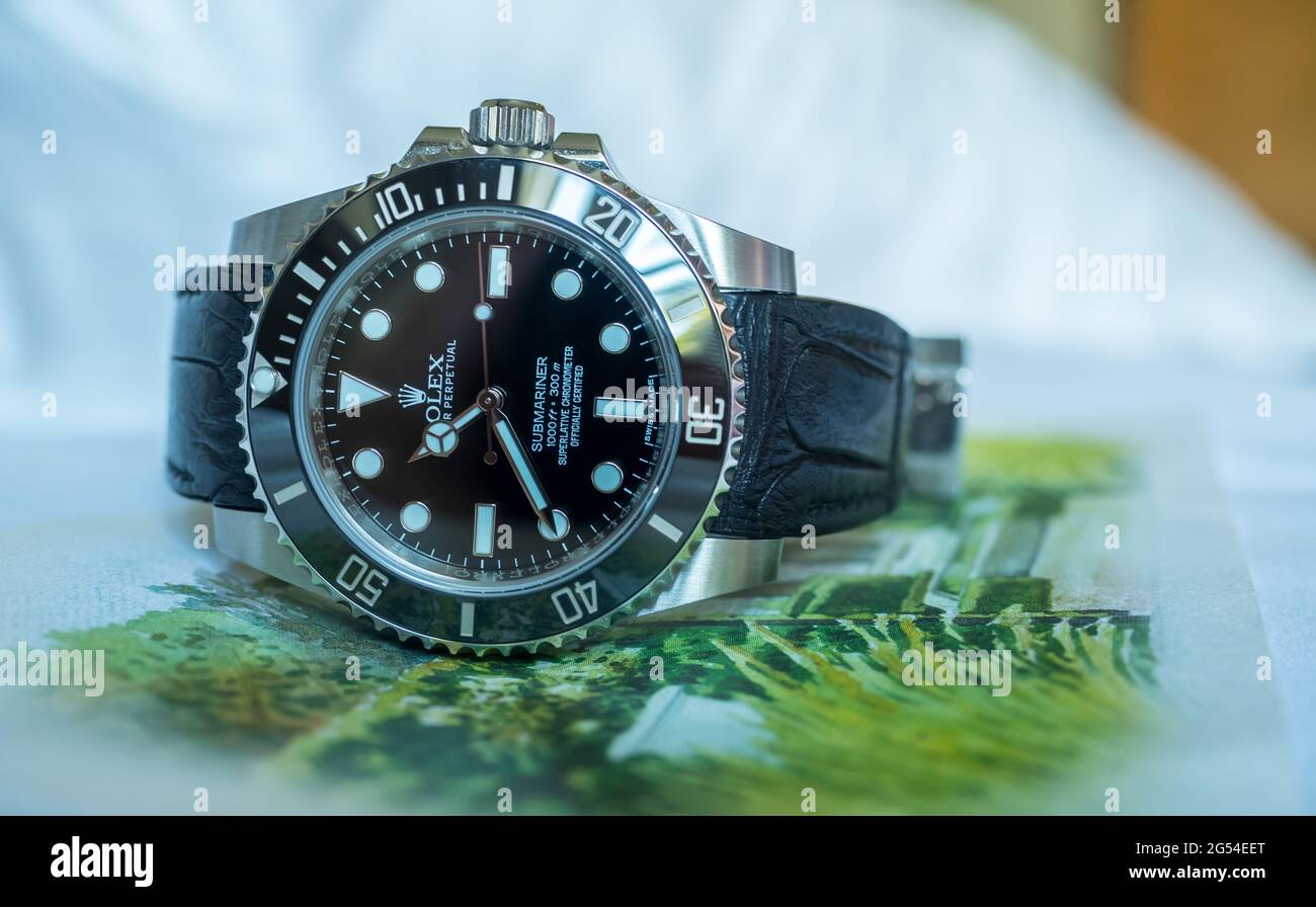 BANGKOK - SEPTEMBER 3 : Rolex submariner no date model with aligator  leather strap lay on colorful postcard was taken in Bangkok, Thailand, on  Septemb Stock Photo - Alamy
