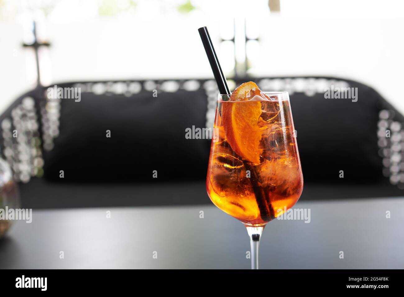 Glass of refreshing cocktail in a bar Stock Photo