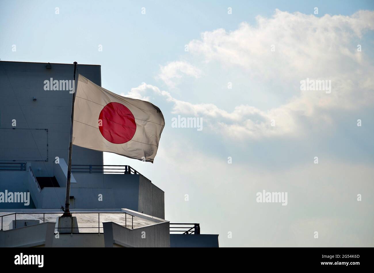 Japan flag waving on the sky of Tokyo Stock Photo