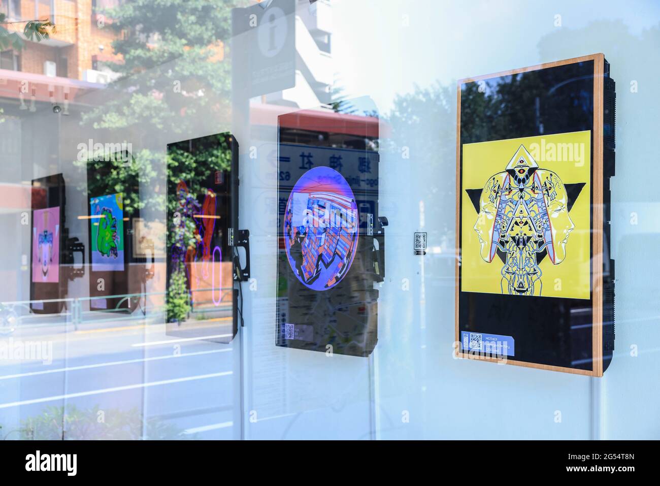 Tokyo, Japan. 25th June, 2021. Digital artwork form different artists is  seen on a wall one day before the opening of CrypTOKYO Blockchain Art  Exhibition 2021 in UltraSuperNew Gallery in Shibuya City.It