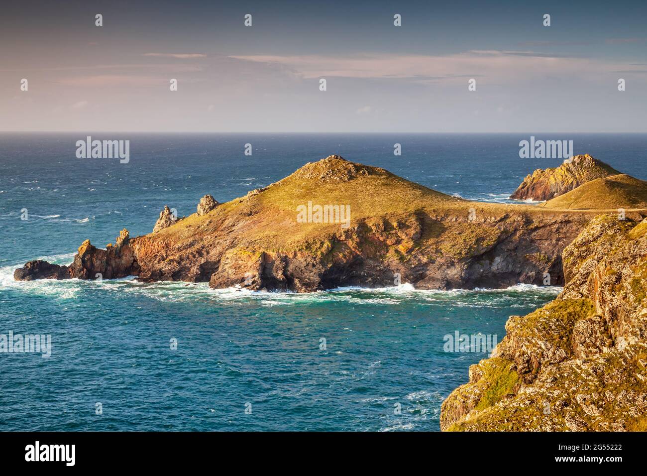 Late afternoon sunshine on the the Rumps at Pentire Point, a stunning stretch of coastline in North Cornwall. Stock Photo