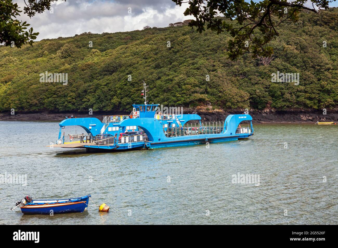 The King Harry Chain Ferry connects St Mawes and the Roseland Peninsula with Feock across the River Fal in Cornwall. Stock Photo