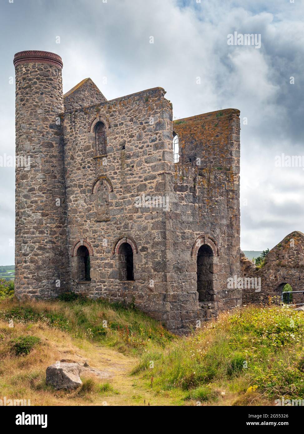 Conserved Frank's Shaft Engine House at Giew Mine forms a prominent landmark near the old St. Ives-Penzance road at Cripplesease in Cornwall. Stock Photo