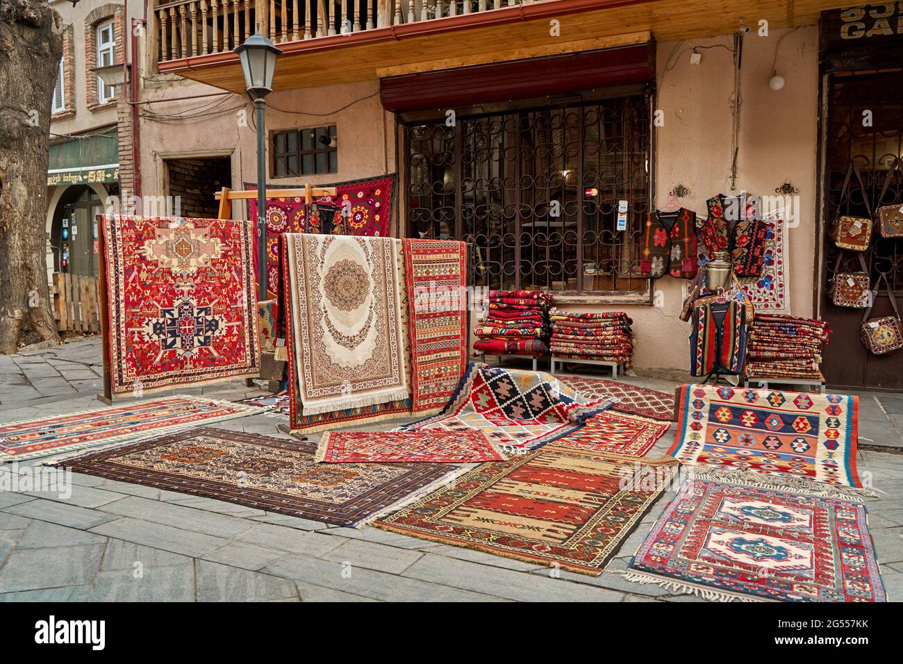 Street counter of traditional carpets on the street in Tbilisi Stock