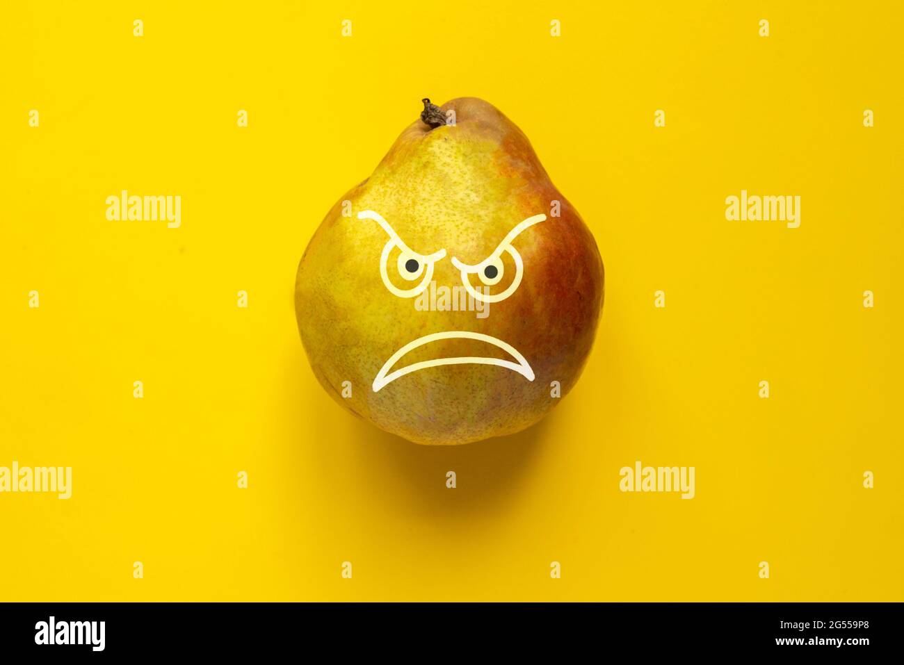 the angry face draw on the fruit food as the halloween concept Stock ...