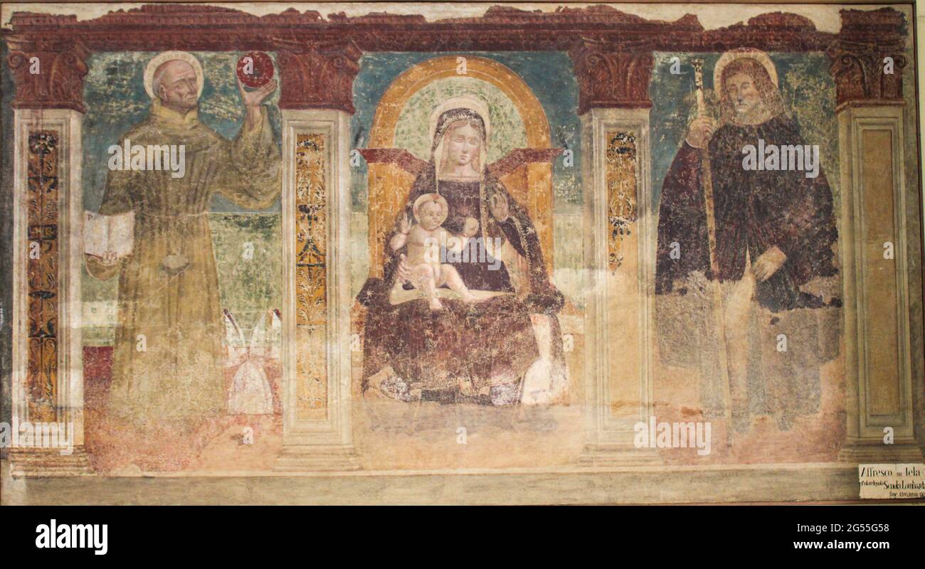 Cesate, Milano, Lombardy, Italy. Santuario della Beata Vergine delle Grazie (Sanctuary of the Blessed Virgin of Graces). Madonna and Child with Saints Bernardine and Roch. Fresco on canvas, anonymous author, period 1400-1500, Lombard School. Stock Photo