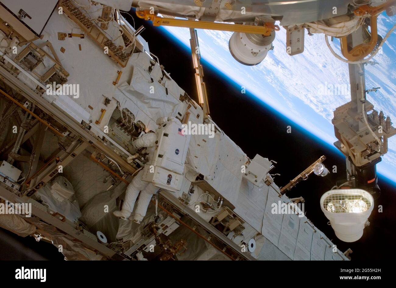 ONBOARD SPACE SHUTTLE DISCOVERY - 08 July 2006 - Astronaut Michael E Fossum, STS-121 mission specialist, participates in the mission's second session Stock Photo